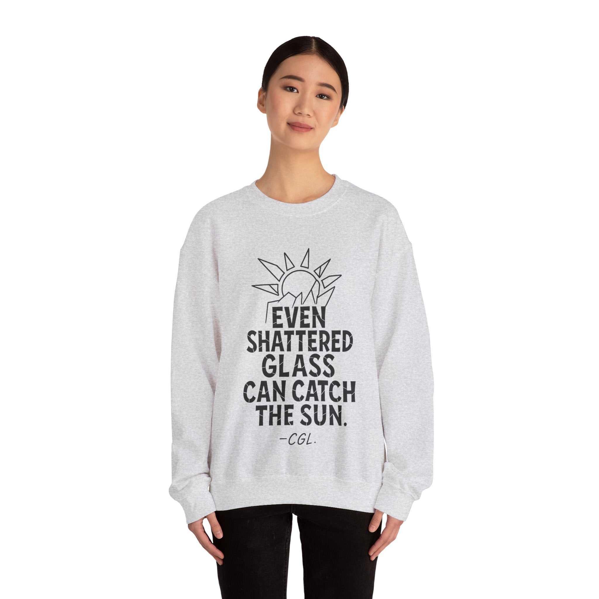 Crewneck Sweatshirt — “Even Shattered Glass Can Catch the Sun” Inspirational Graphic
