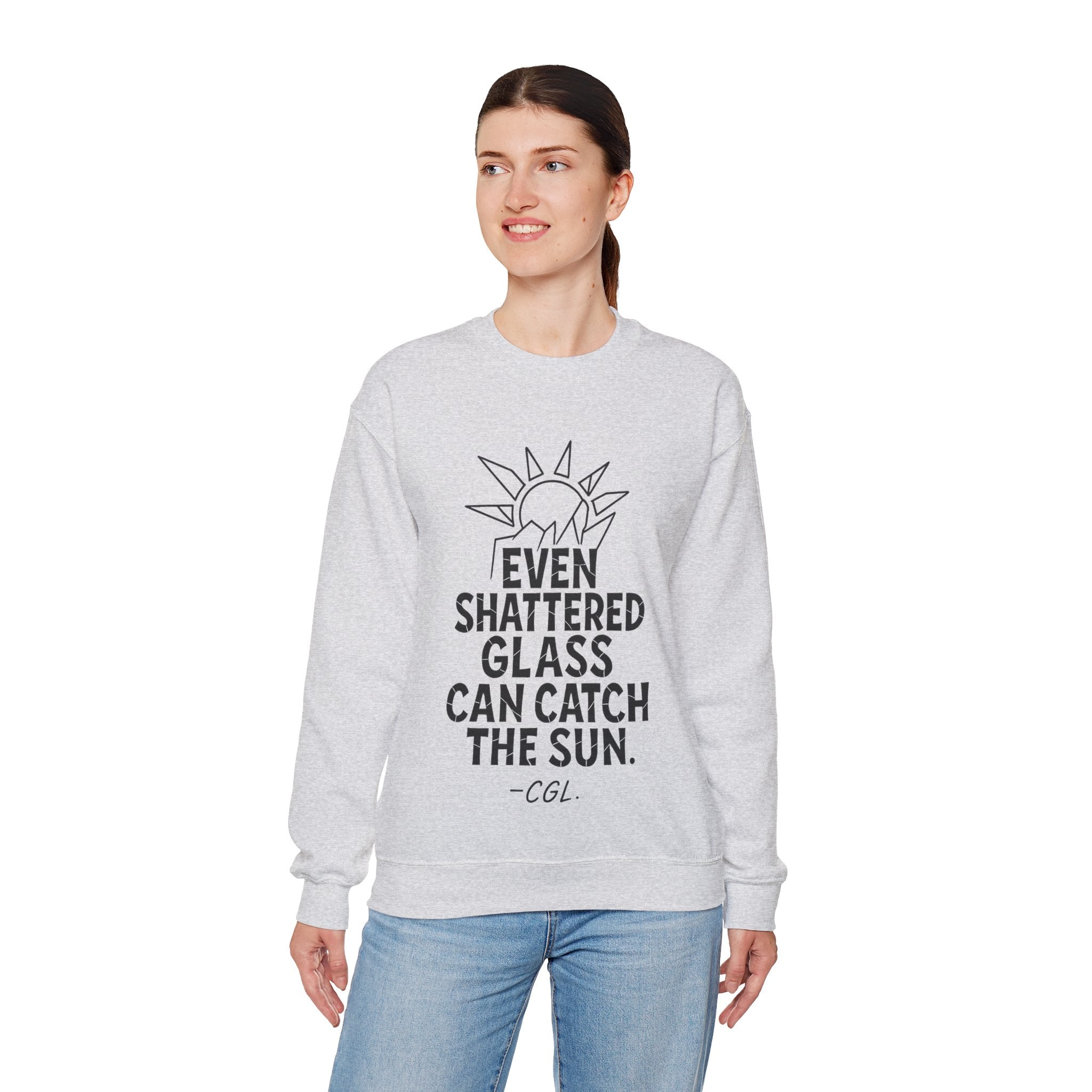 Crewneck Sweatshirt — “Even Shattered Glass Can Catch the Sun” Inspirational Graphic