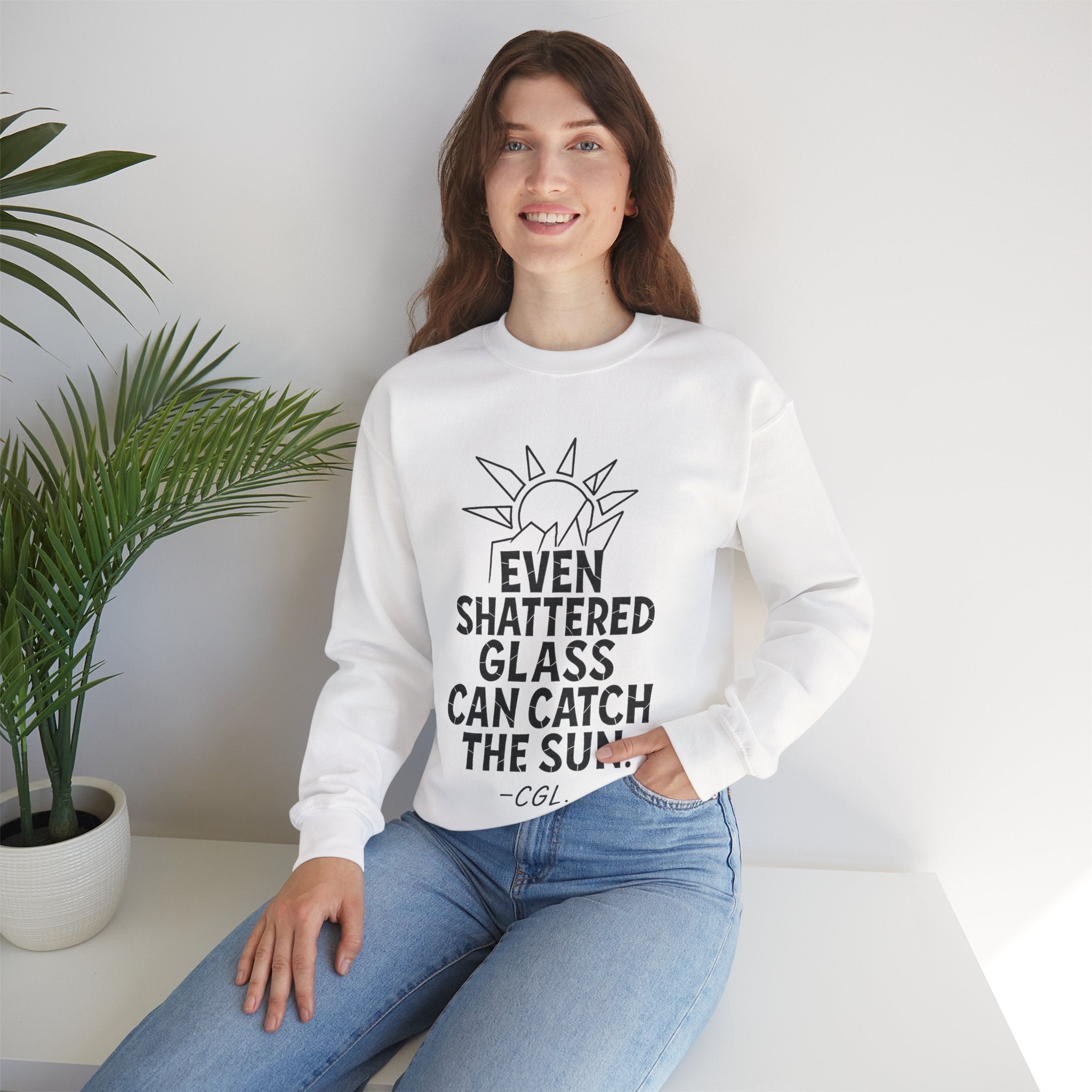 Crewneck Sweatshirt — “Even Shattered Glass Can Catch the Sun” Inspirational Graphic